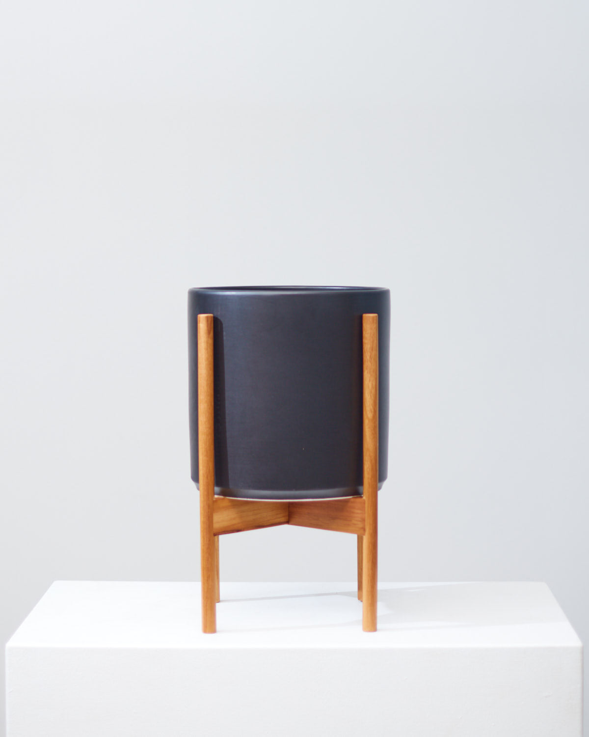 10 Inch REVIVAL CERAMICS BLACK CYLINDER WITH NATURAL TEAK STAND - Medium